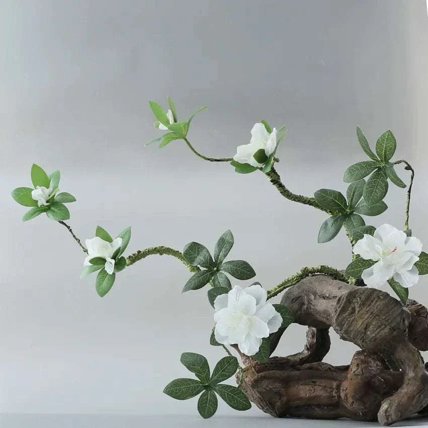 Faux Azaleas Branch with realistic greenery for home decor.