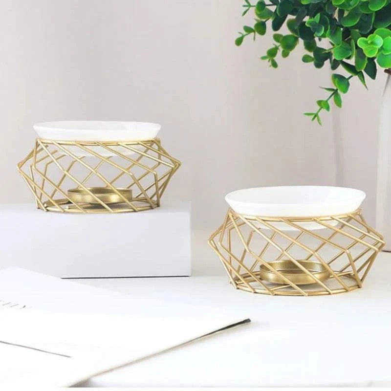 Elegant gold geometric Aromatic Oil Burner for home aromatherapy.
