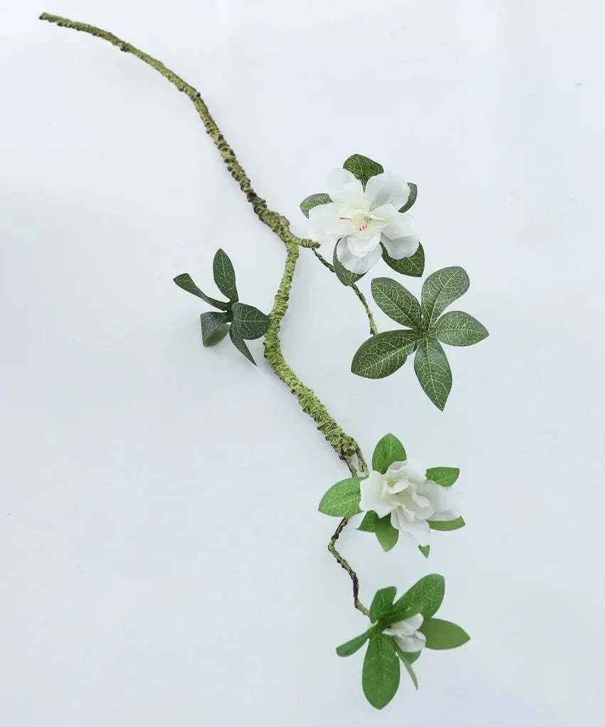 Faux Azaleas Branch with white blossoms for elegant home decor.