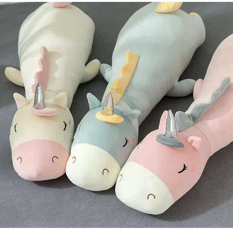 Giant unicorn pillow for kids with ultra-soft, whimsical design.