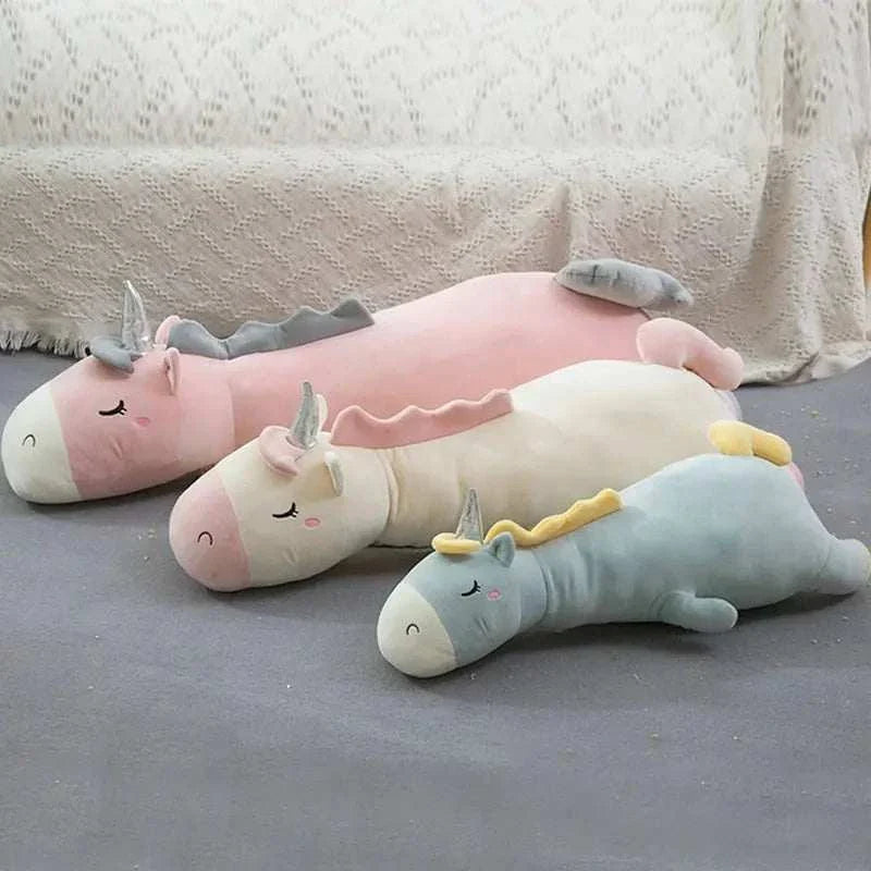 Giant unicorn pillow for kids with ultra-soft, whimsical design.