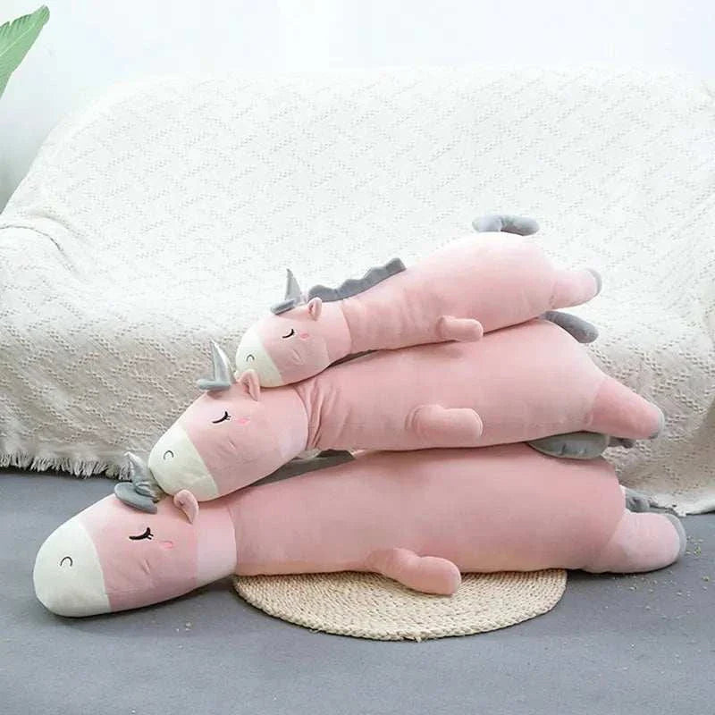 Giant unicorn pillow with ultra-soft materials for kids' comfort and imaginative play.