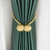 BELAVENIR Magnetic Curtain Tieback organizing green curtains with gold accent