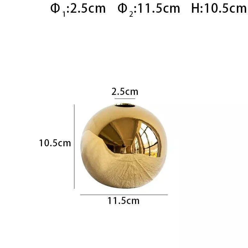 Gold Nuala Vase with sleek spherical design, 11.5cm diameter, enhances home decor elegance.