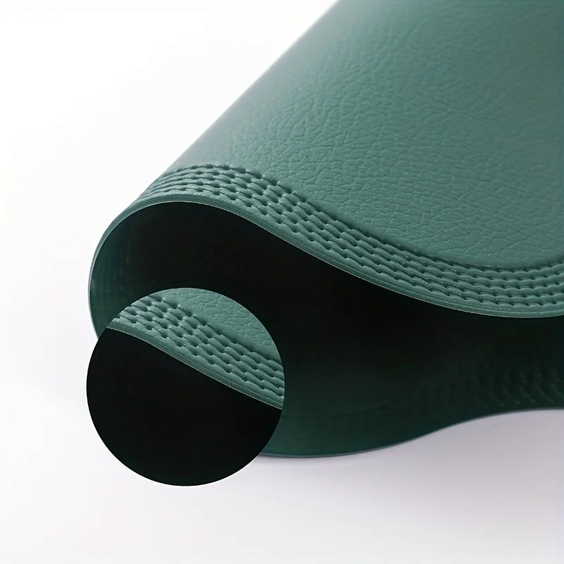 Noah's Placemats in elegant green with textured detail.