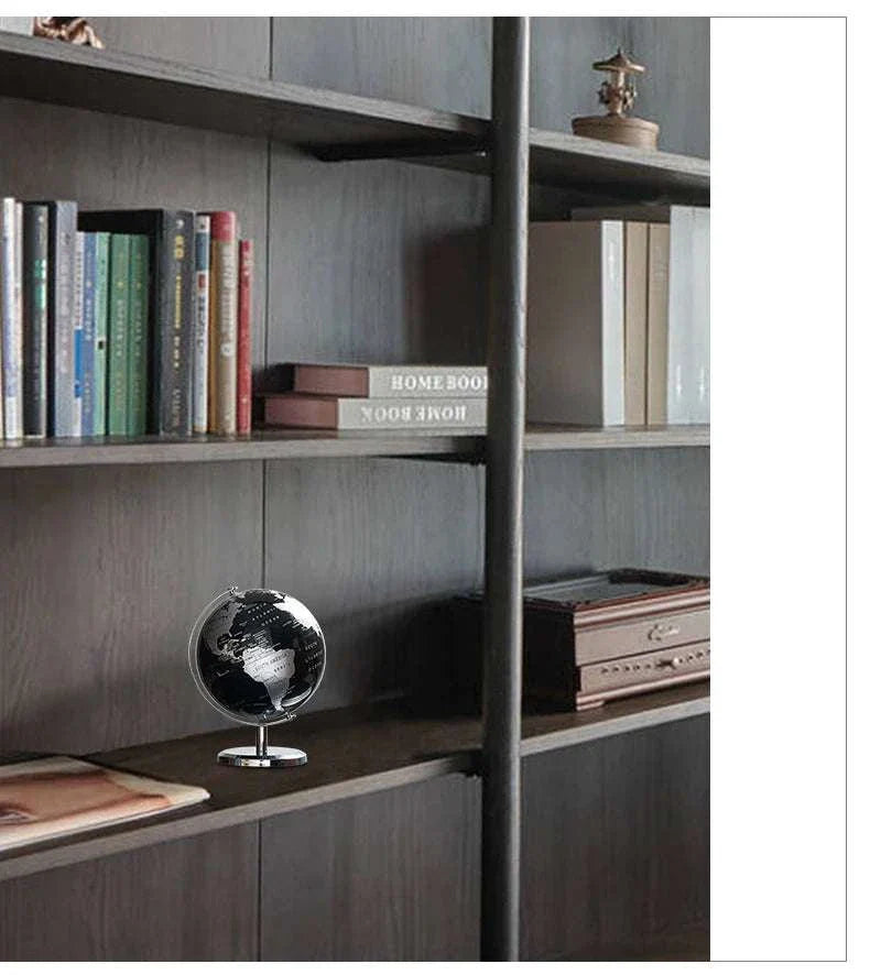 Aya Globes in black on a stylish bookshelf, enhancing home or office decor.