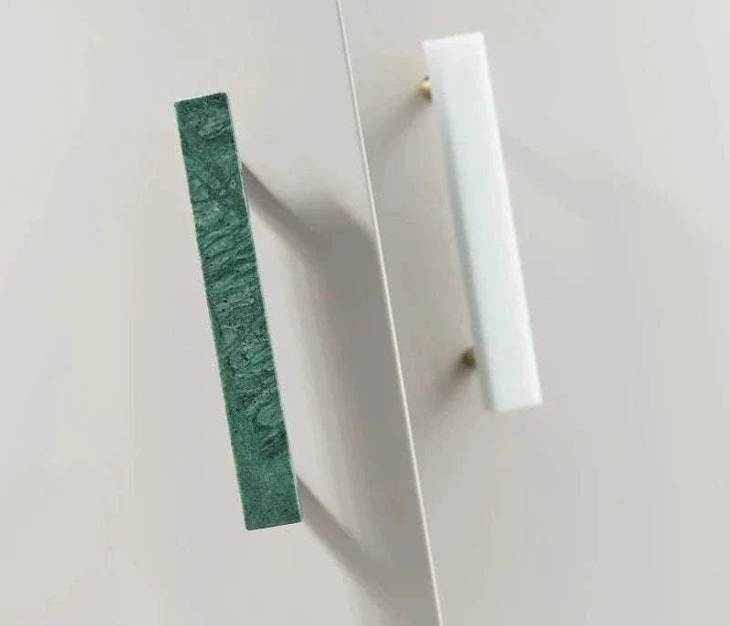 Anessa Handles with brass base, featuring elegant white and green marble design.
