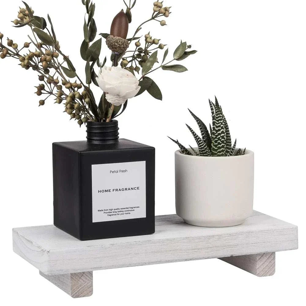 Small wood riser for desk organization and ergonomic comfort.