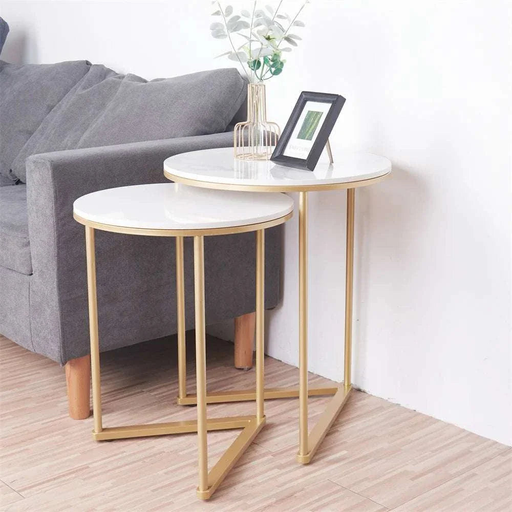 Modern Mariah side table set of 2 with white marble tops and gold metal bases for living room.