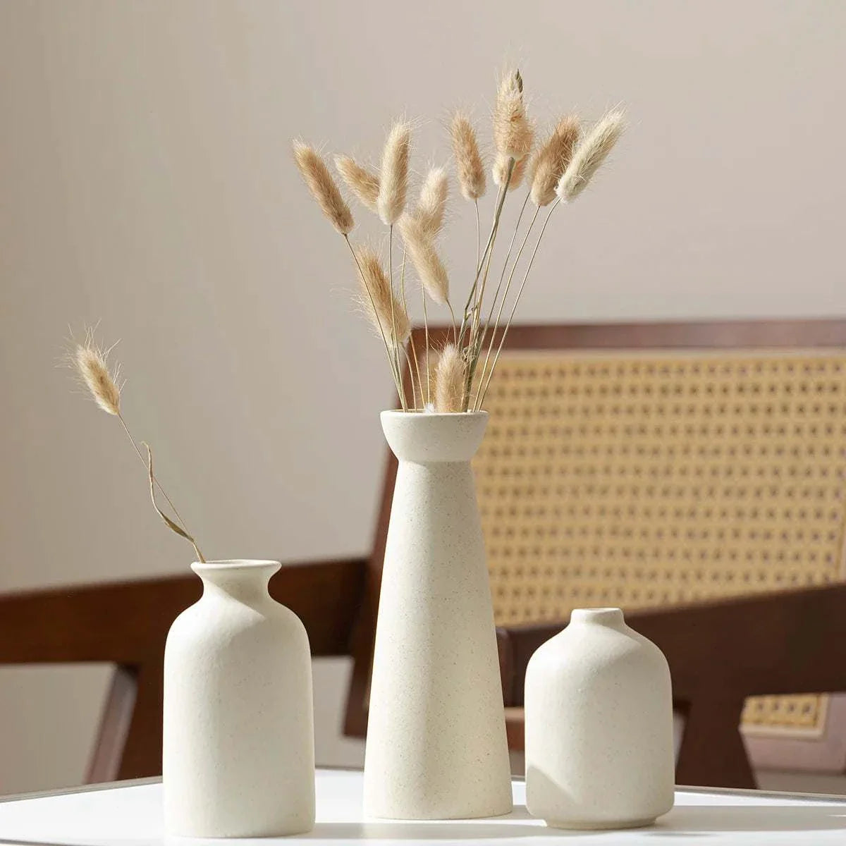 Minimalist cream ceramic Wulf Vases display.