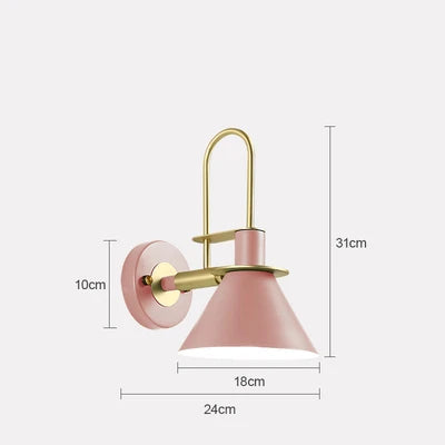 Sleek modern Dexter wall lamp with adjustable arm in pink and gold design.