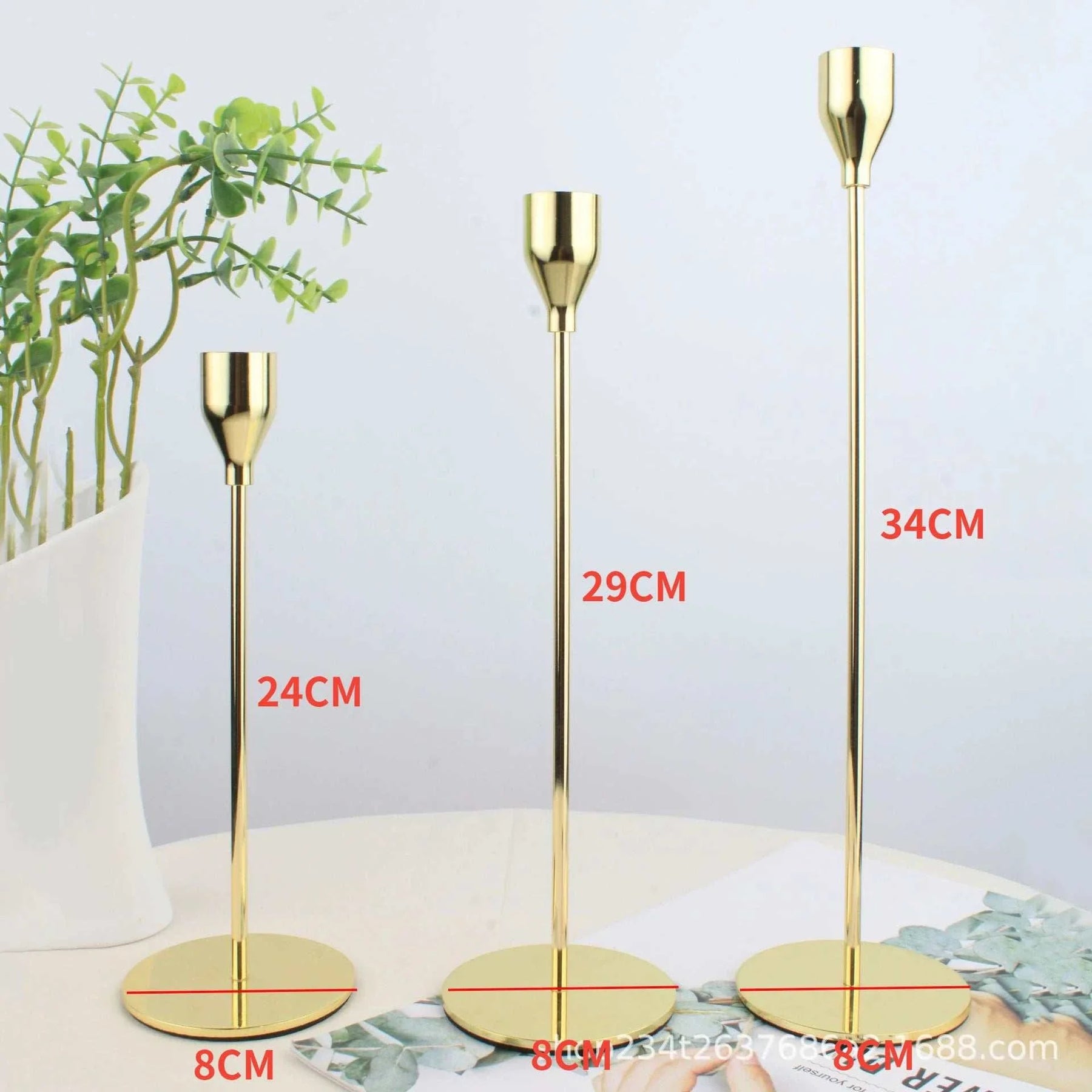 Durable metal Alison Candle Holder with sleek design, shown in three sizes, adding elegance and warmth to home decor.