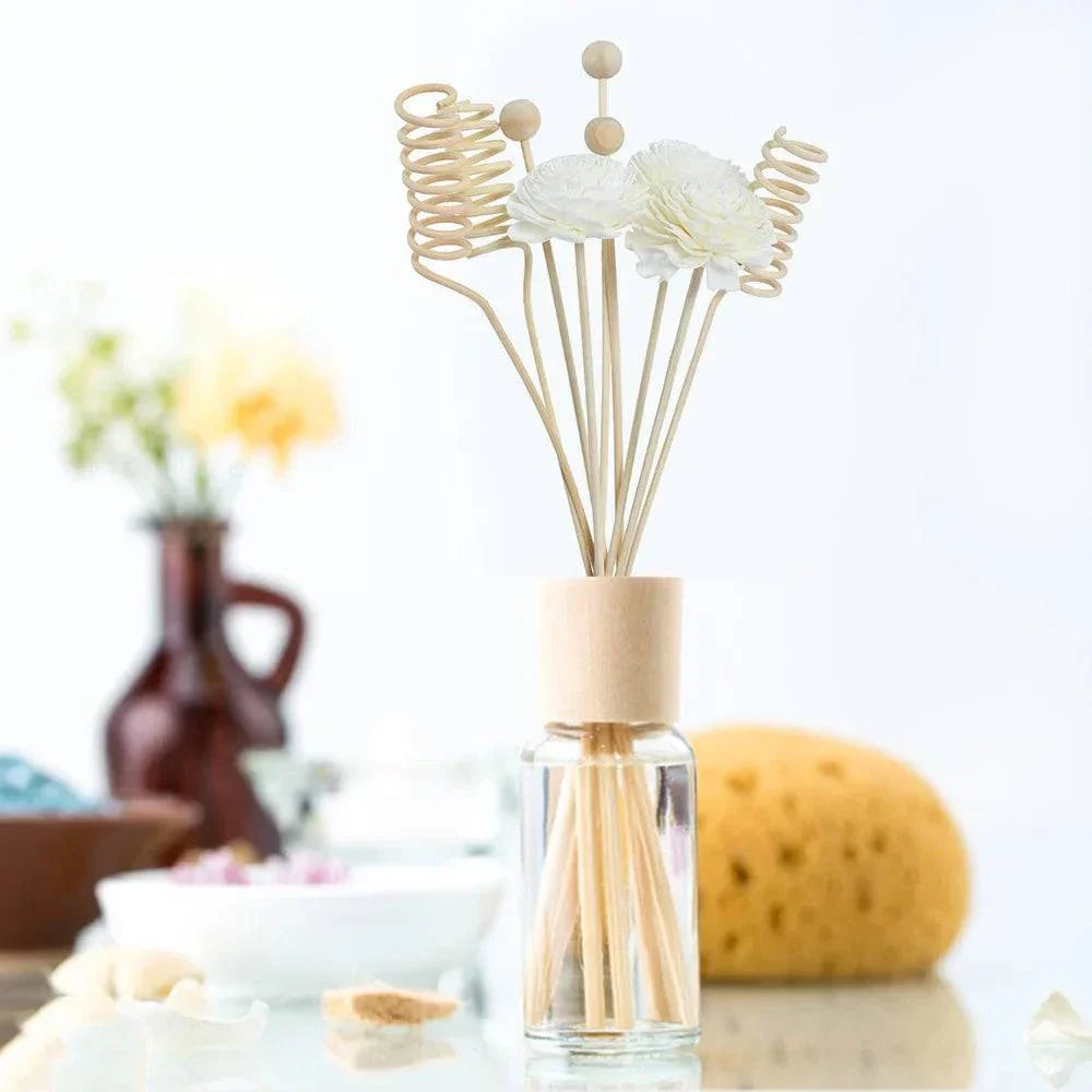 Yeulion Diffuser Sticks with floral designs in a glass jar, 9-piece set for aromatherapy and home decor.