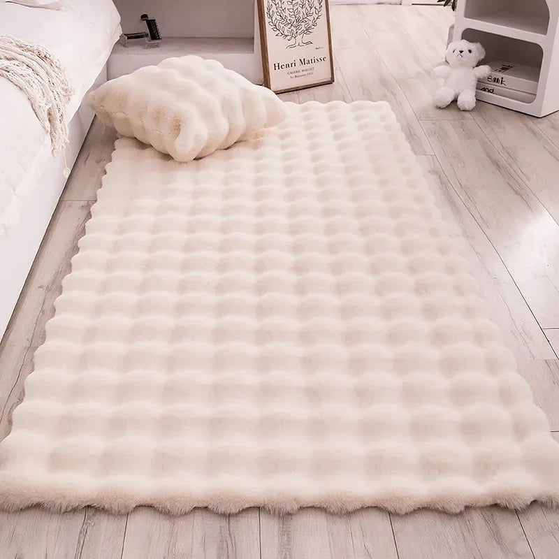 Soft and luxurious Adjoa Rugs in a cozy room.