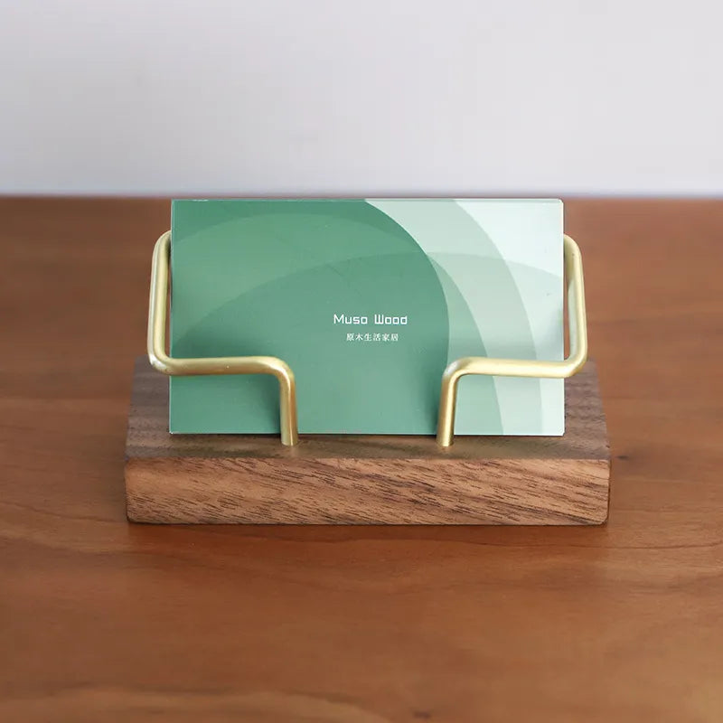 Wooden card holder with a stylish design, made from quality wood, for desk organization.