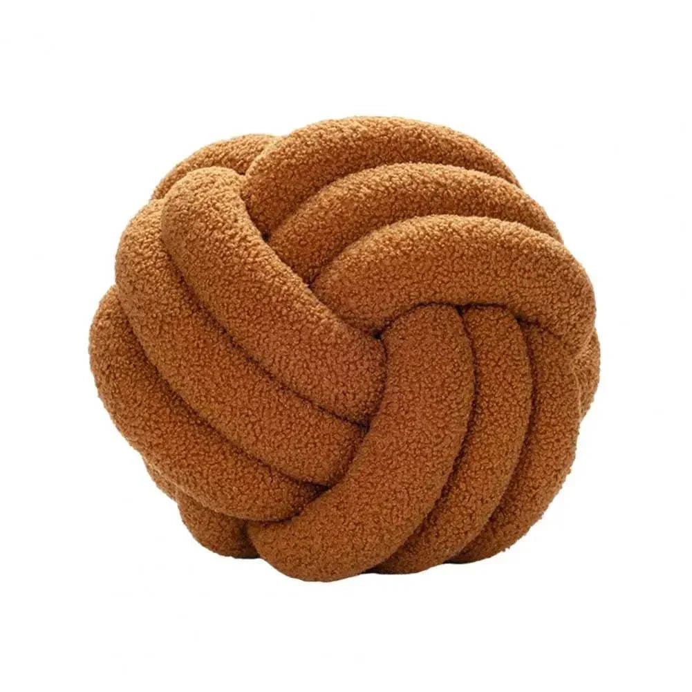 Knotted Ball Pillow for kids' rooms, cozy and stylish.