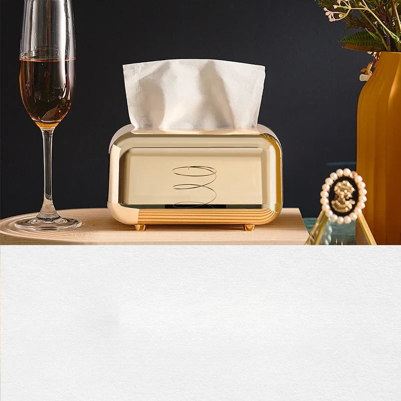 Luxie tissue box with luxurious gold finish, elegant decorative piece.