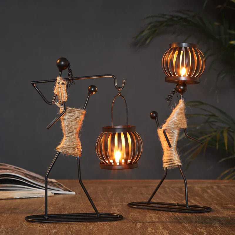 African-themed Ewa Candle Holder with intricate woman design and candlelight ambiance.