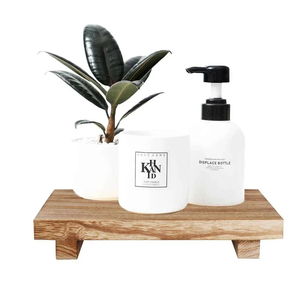 Small Wood Riser with plant and bottle on top, ideal for desk organization and ergonomic comfort.