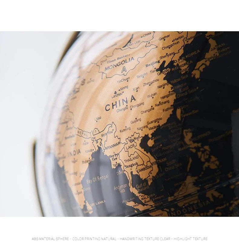 Elegant Aya Globe in black and bronze for sophisticated home or office decor.
