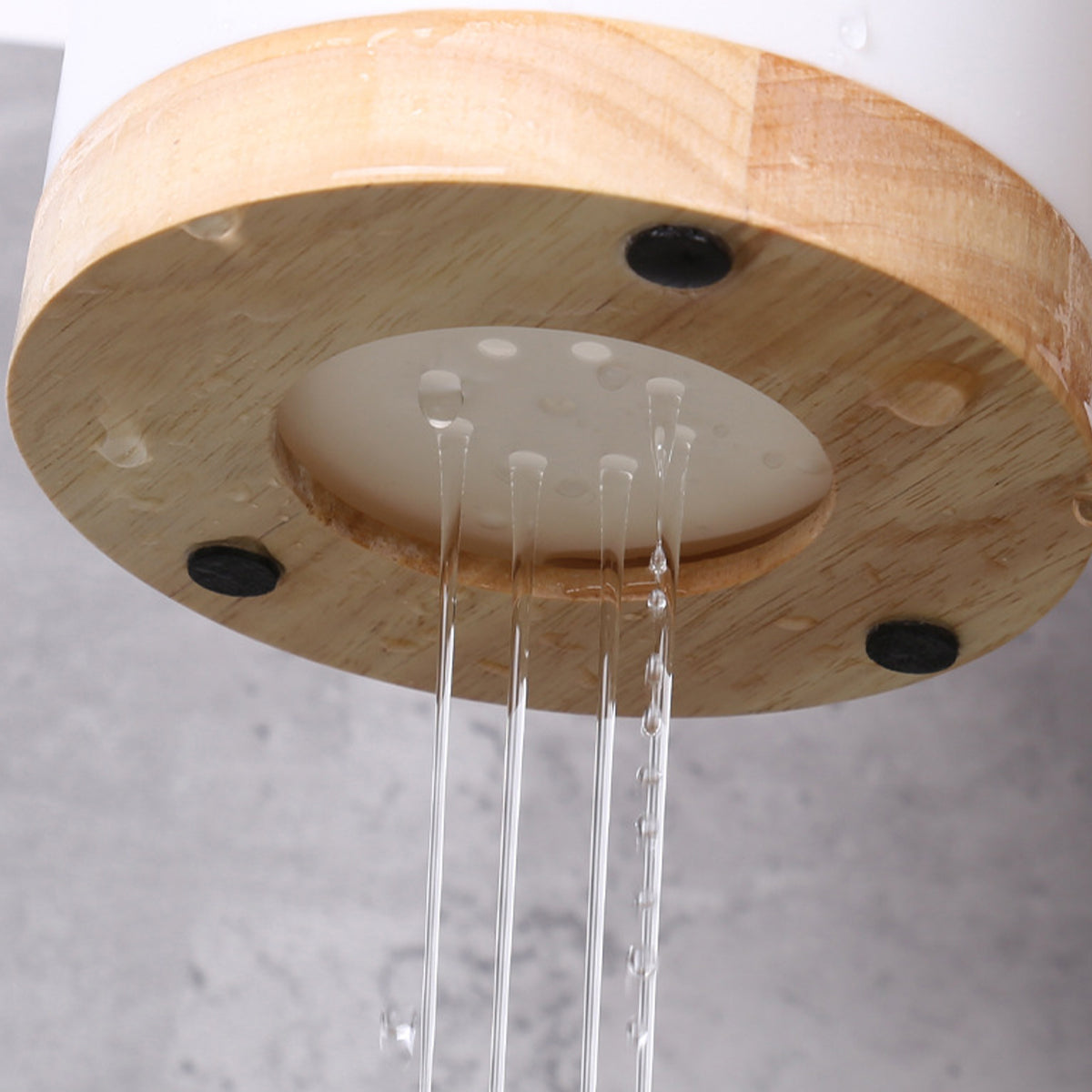 Durable cutlery drainer with a wood and ceramic look, ideal for organizing kitchen utensils.