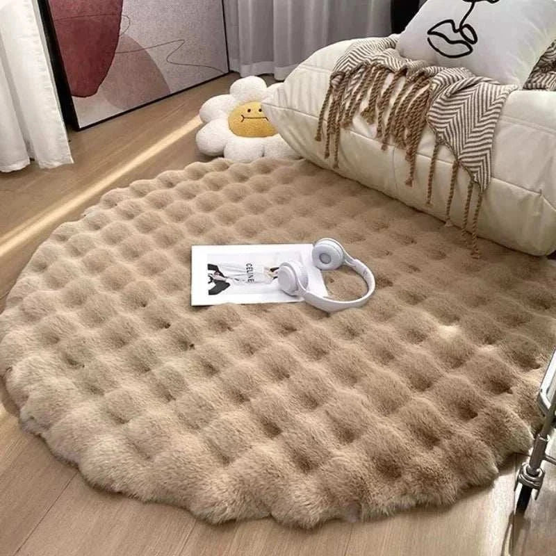 Round Wynter rug adding cozy elegance to living space.