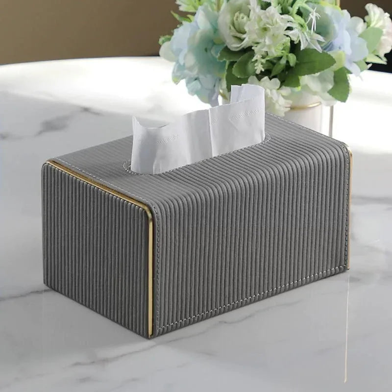 Ribbed Tissue Box with elegant textured design on marble surface.