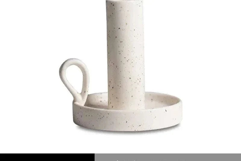 SUKi candle holder, minimalist ceramic design for elegant home decor.