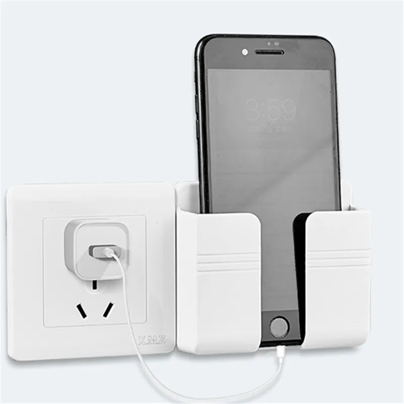 Wall-mounted Yalp Storage Box organizing phone next to power outlet.