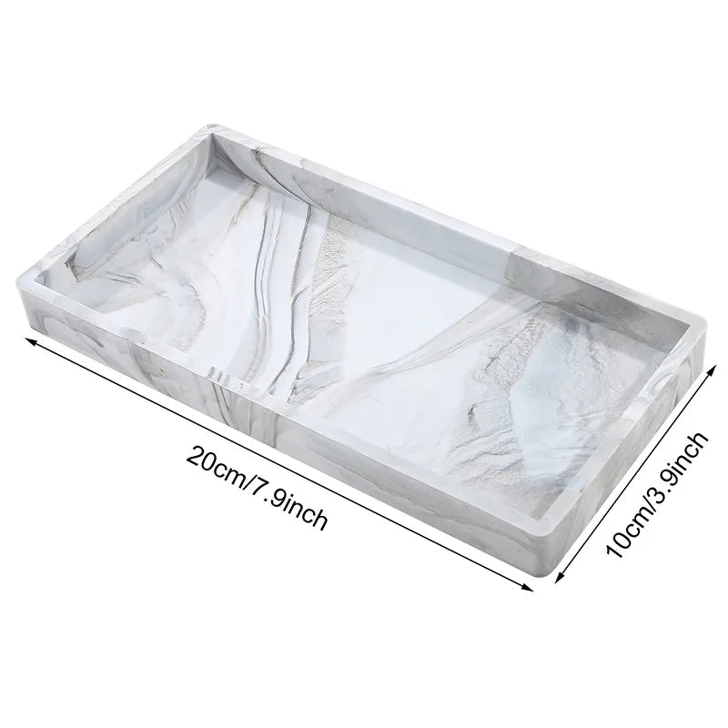 Silicone soap dispenser tray for bathroom and kitchen organization.