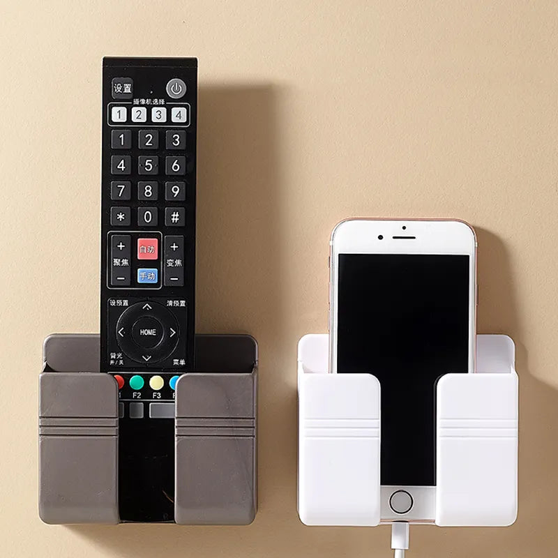 Yalp Storage Box wall-mounted for organizing remotes and phones.