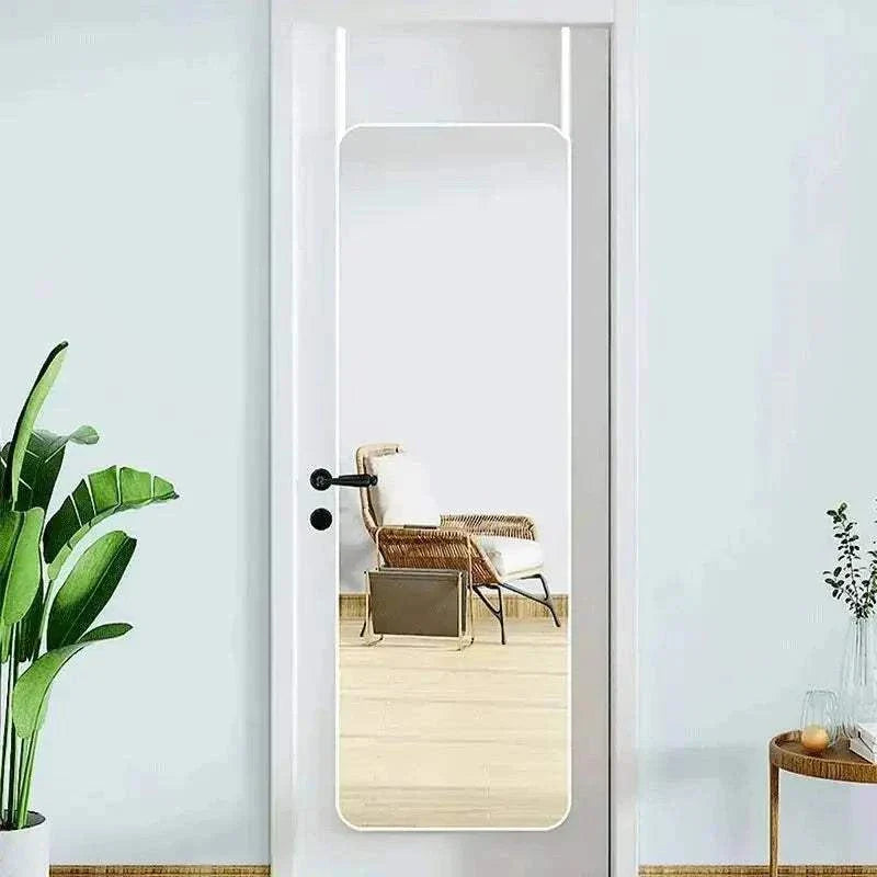 Full length door hanging mirror with metal frame in white, mounted vertically.