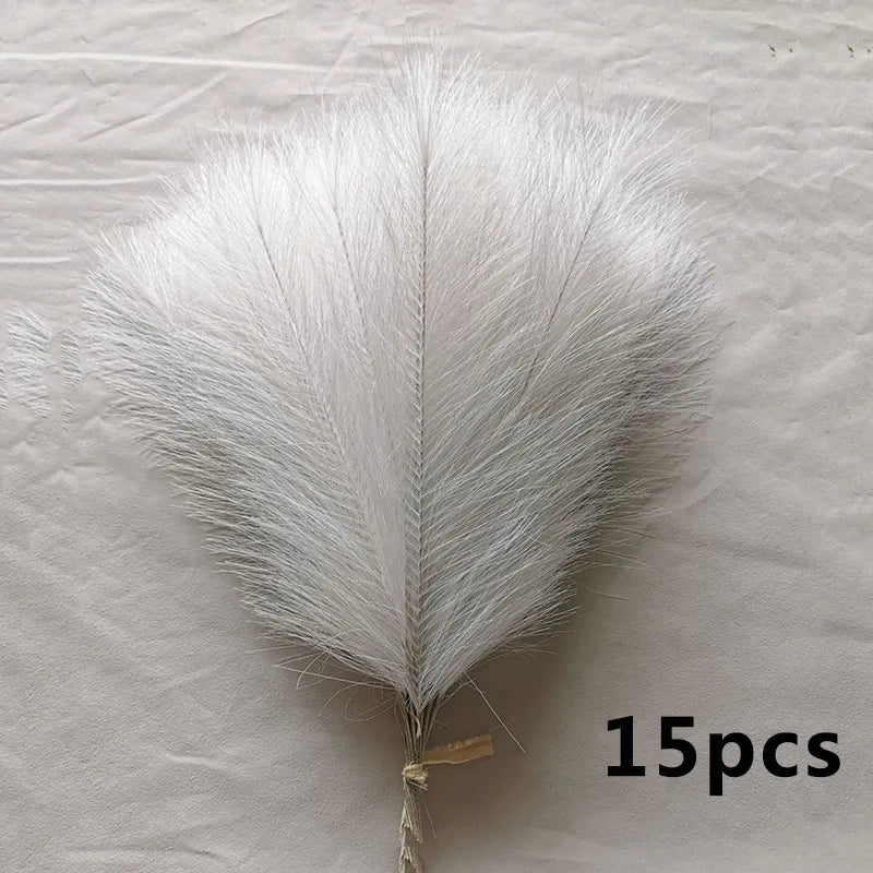 Saif Faux Pampas Grass bundle on white surface, 15 pieces.