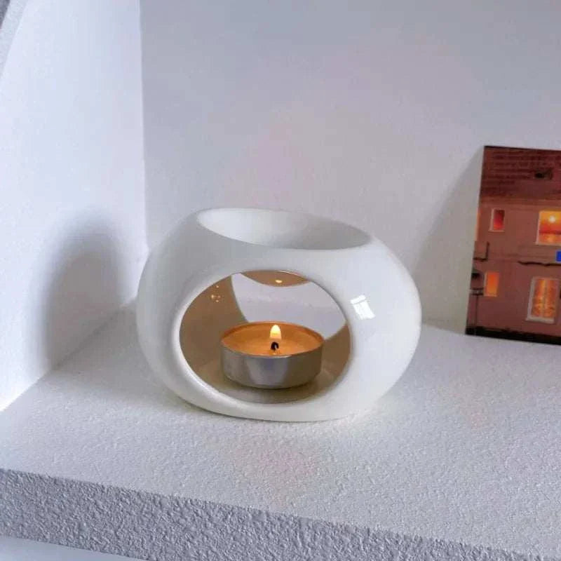 Reis Candle Burner made of durable ceramics, ideal for aromatherapy and home relaxation.