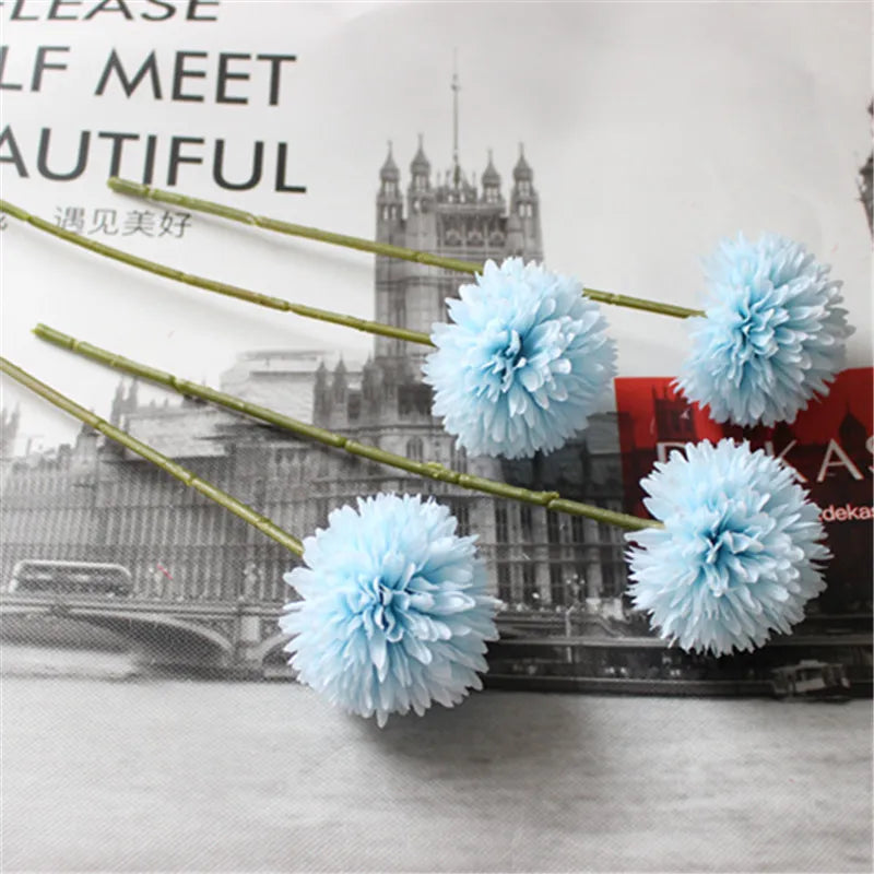 Celine Faux Dandelion Flower with lifelike blue petals on thin green stems, adding elegance to home decor.