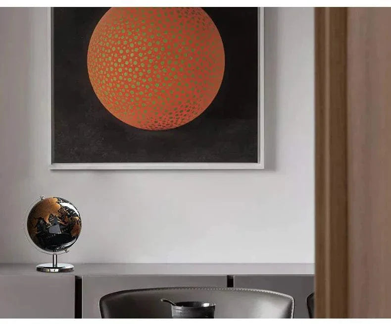 Aya Globes in elegant black, bronze, and gold enhancing home decor.