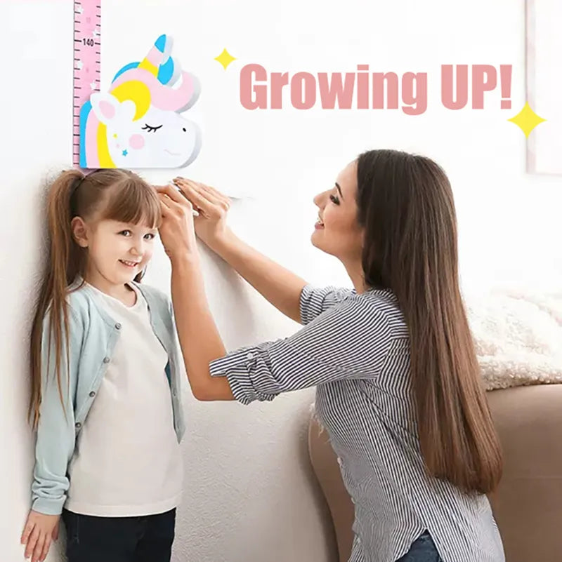 Cartoon unicorn height sticker on wall measuring child's height.