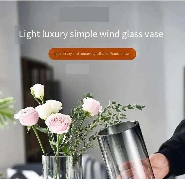 Elegant Sphinx Vases combining glass and wood, showcasing flowers in a stylish home setting.