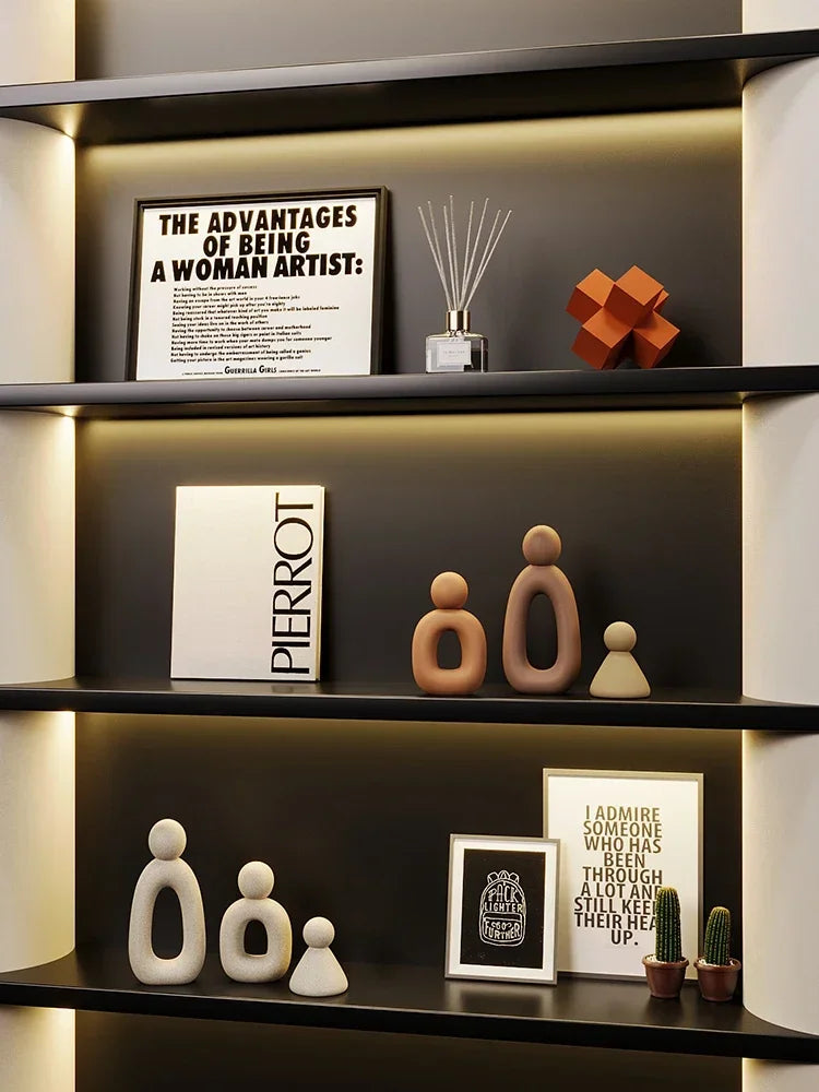 Minimalism Family Statue with neutral palette on display shelf.