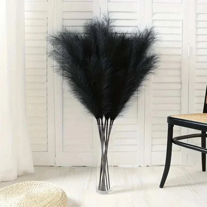 Faux Pampas Grass in a glass vase adds boho style to home decor.