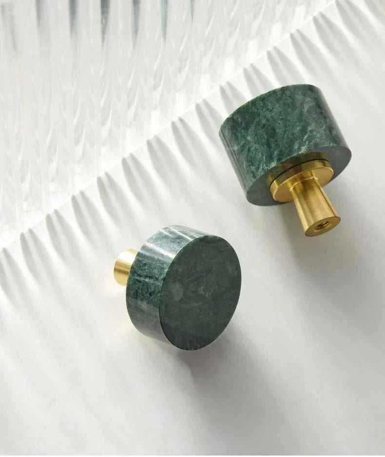 Durable brass door knobs with white and green marble detailing from Anessa Handles.