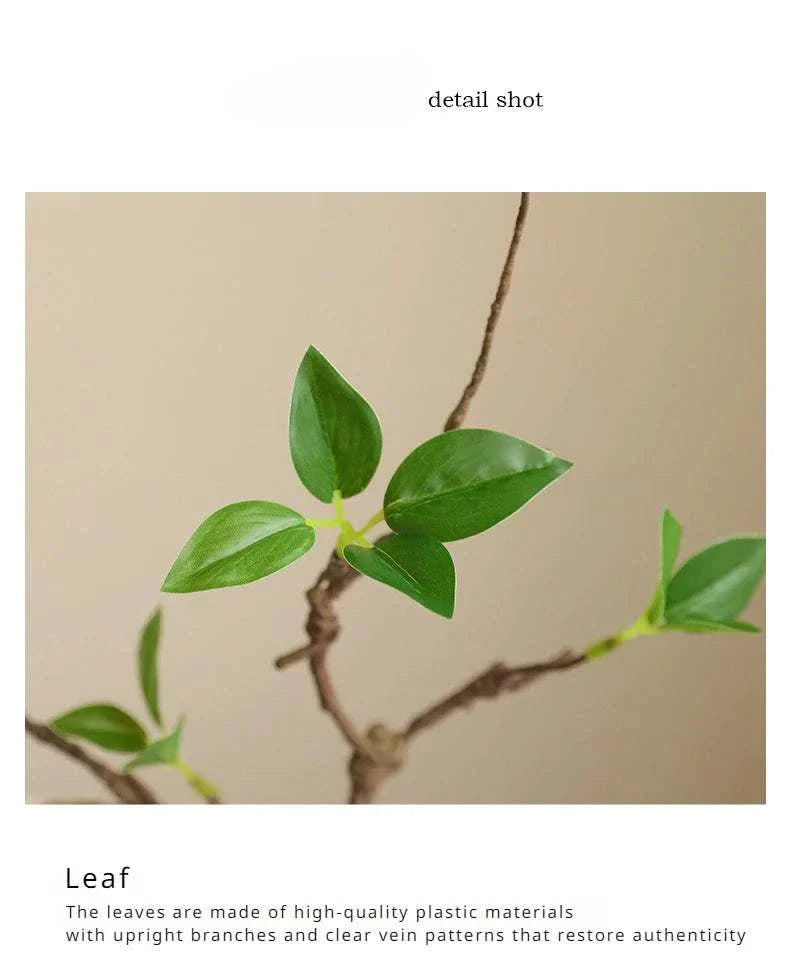 Faux withered branches with green leaves, highlighting realistic textures and elegant design.