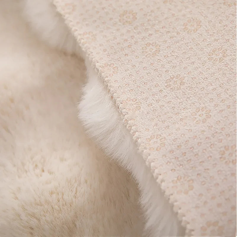 Adjoa Rugs close-up showing soft polyester texture and elegant pattern.