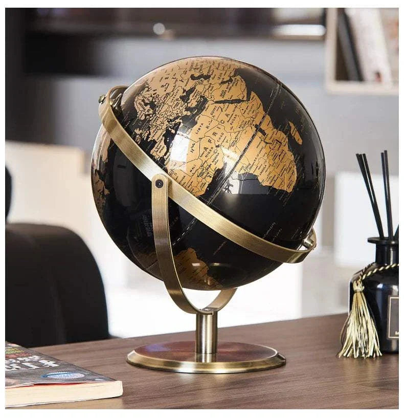 Aya Globes in black and gold, sophisticated decor piece.