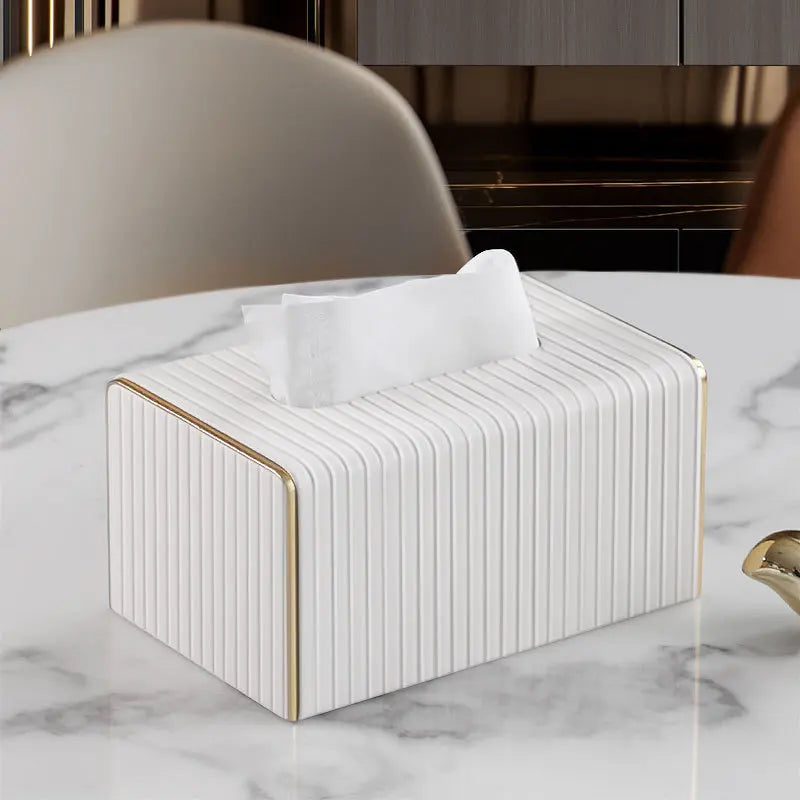 Ribbed Tissue Box with elegant ribbed texture on marble table.