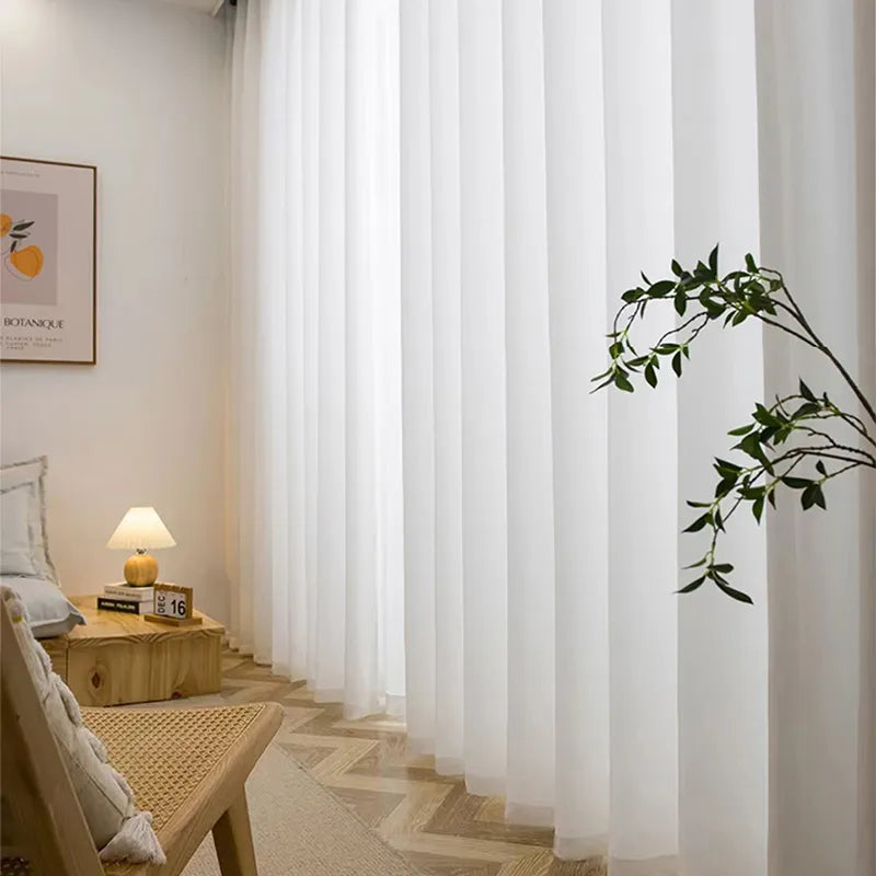 Alae White curtains in a stylish living room setting, showcasing elegant and high-quality chiffon fabric.