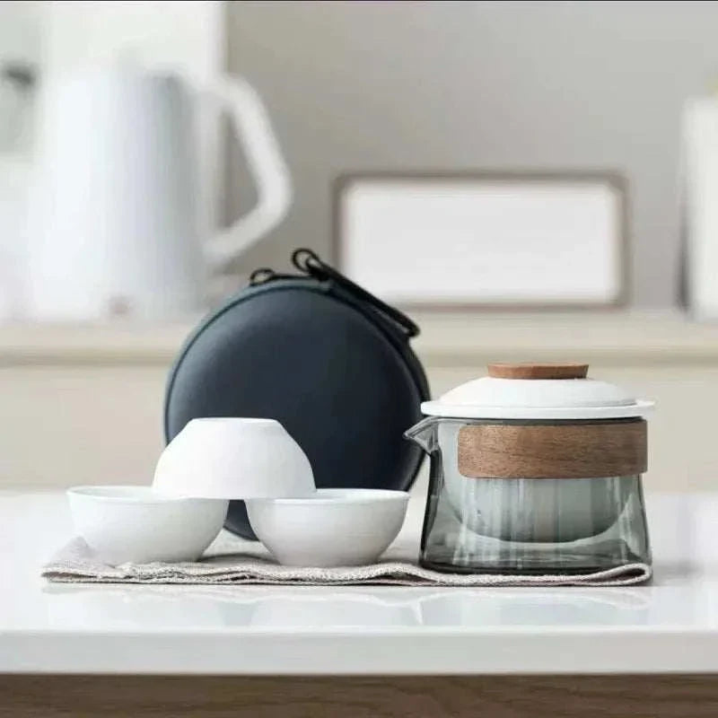 Zen Teapot and Tea Cup set with minimalist design displayed on a table.