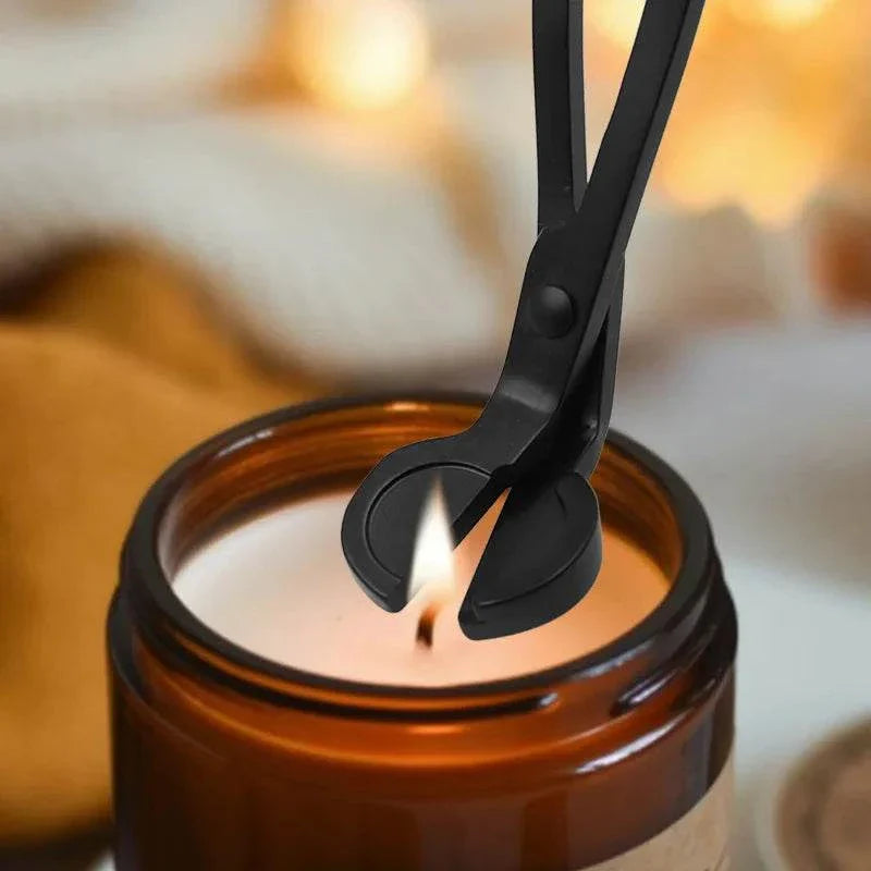 Candle Trimmer cutting wick for optimal candle burn.