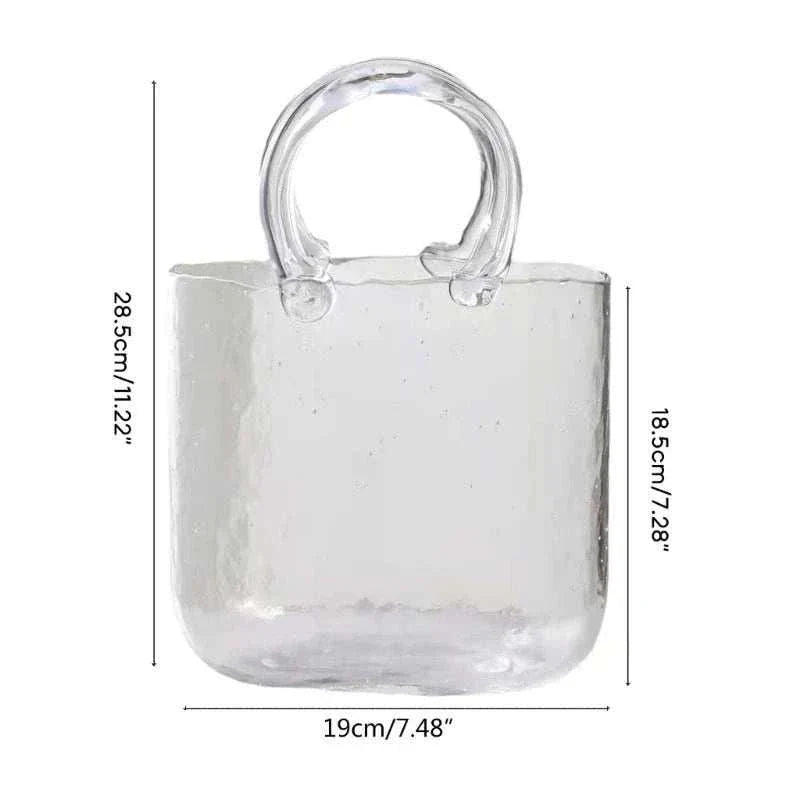 Glass vase shaped like a tote bag with dimensions 28.5cm by 19cm.
