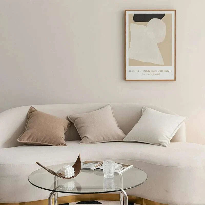 Noori Cushion Covers on a stylish sofa, enhancing home decor with comfort and luxury.